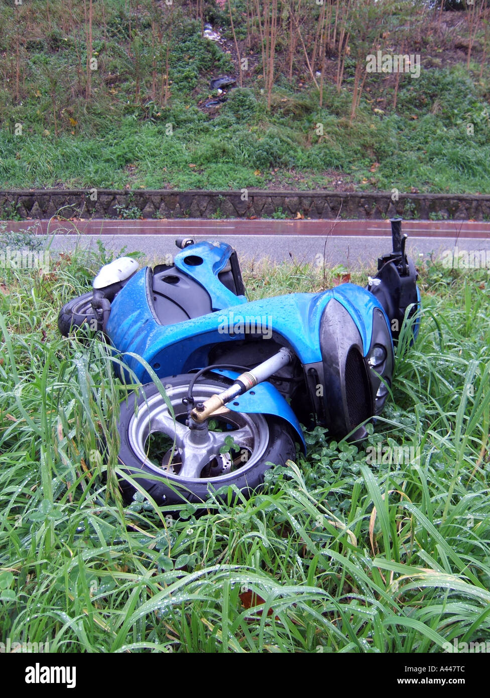 abandoned blue scooter Stock Photo Alamy