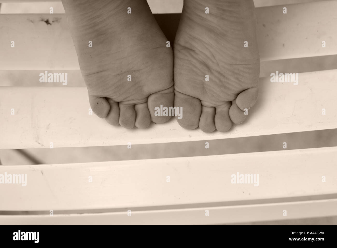 Child's Feet toes and sole of foot Stock Photo