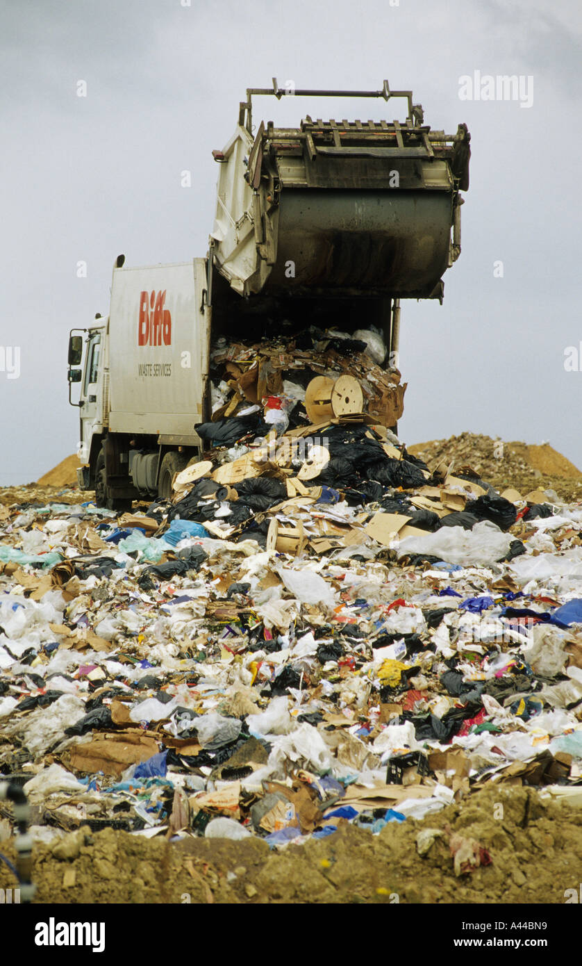 Waste truck working at landfill site Borough Green Kent Stock Photo