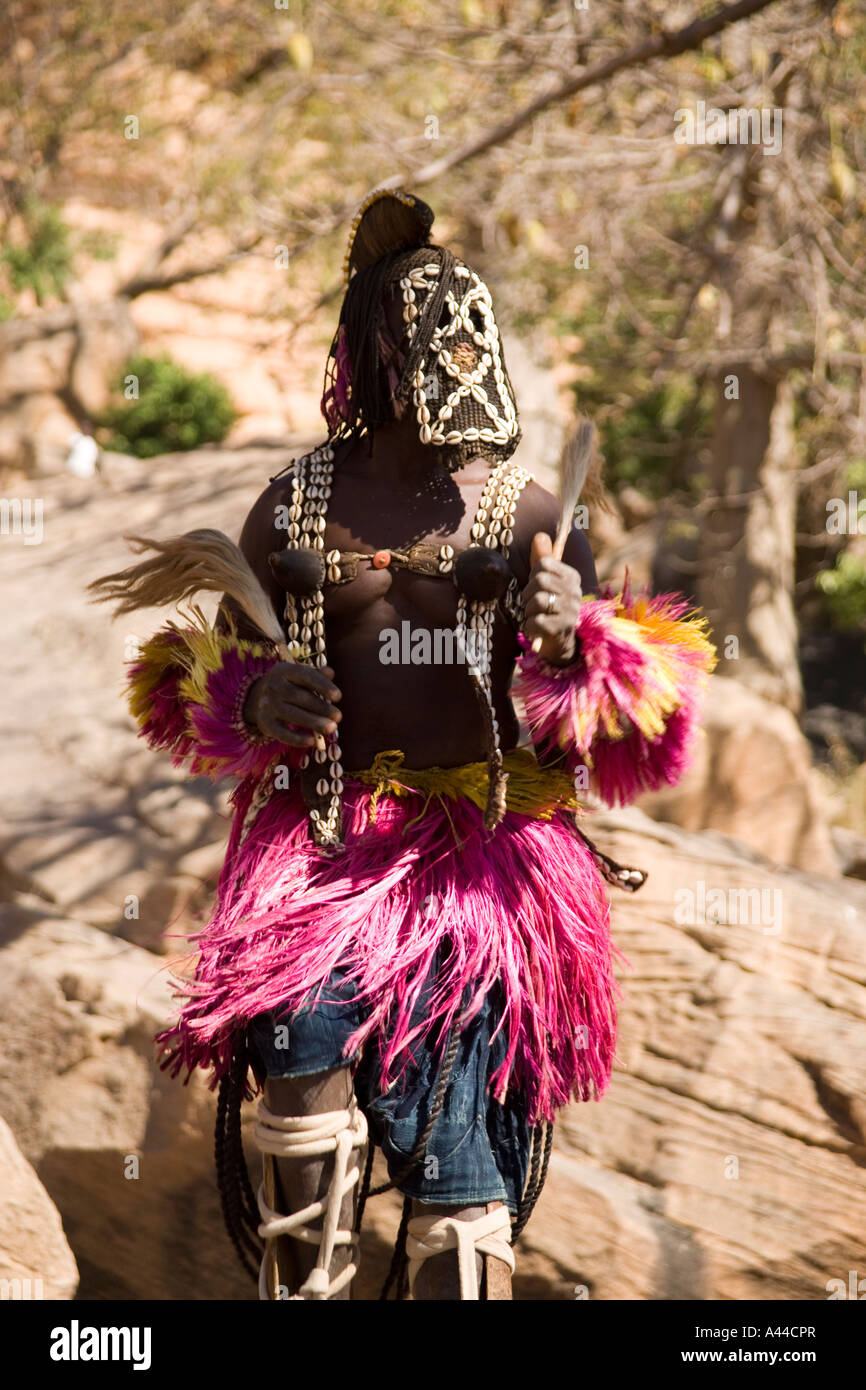 Stilt dancer at the mask dance in the village of Tereli, Dogon Country ...
