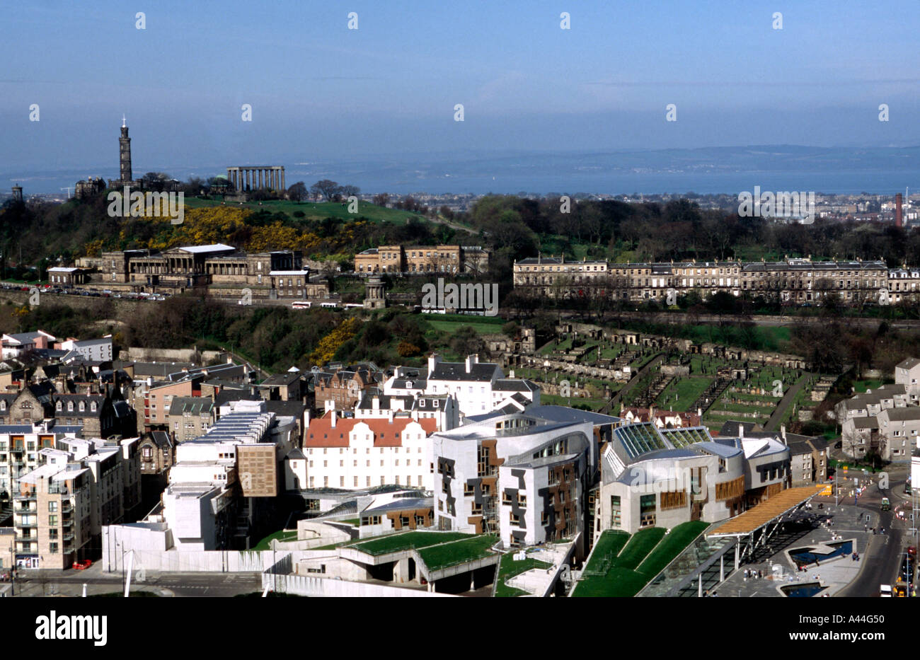 The Scottish Parliament and Calton Hill in Edinburgh Scotland from Salisbury Craigs Stock Photo
