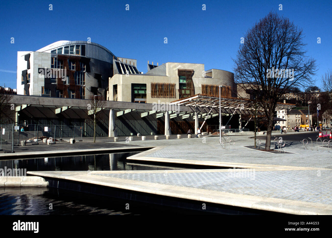 The facade and entrance to the Scottish Parliament with specially designed water features in the foreground Stock Photo