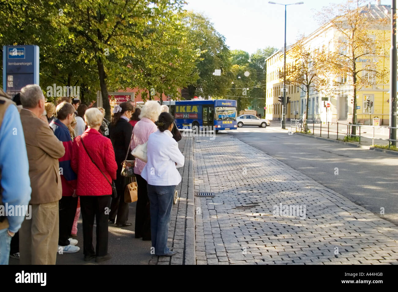 group of people waiting the IKEA bus downtown Oslo Norway year 2005 Stock Photo - Alamy