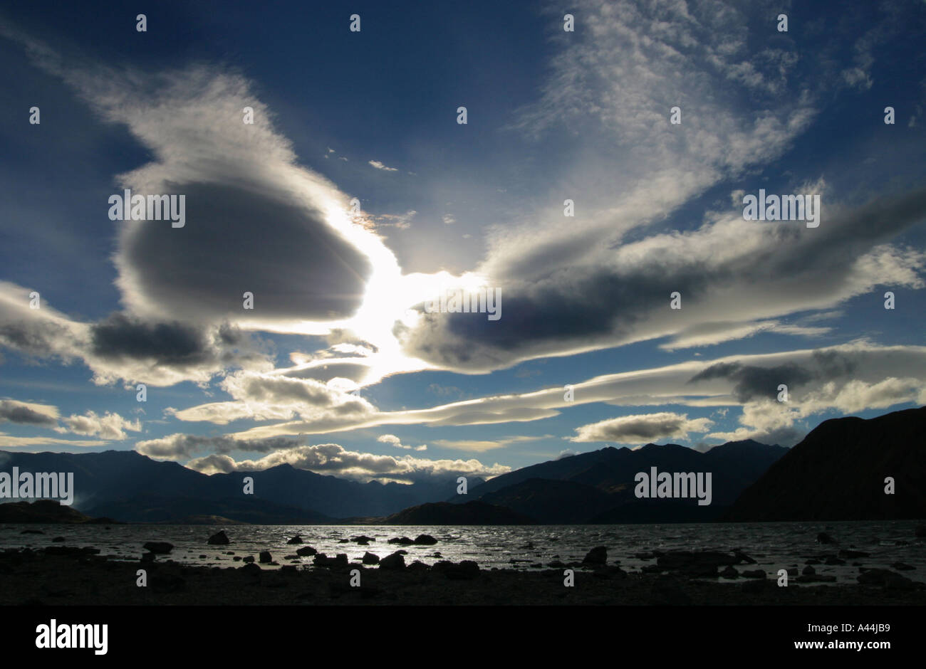 Lenticular clouds over Lake Wanaka New Zealand South Island Stock Photo