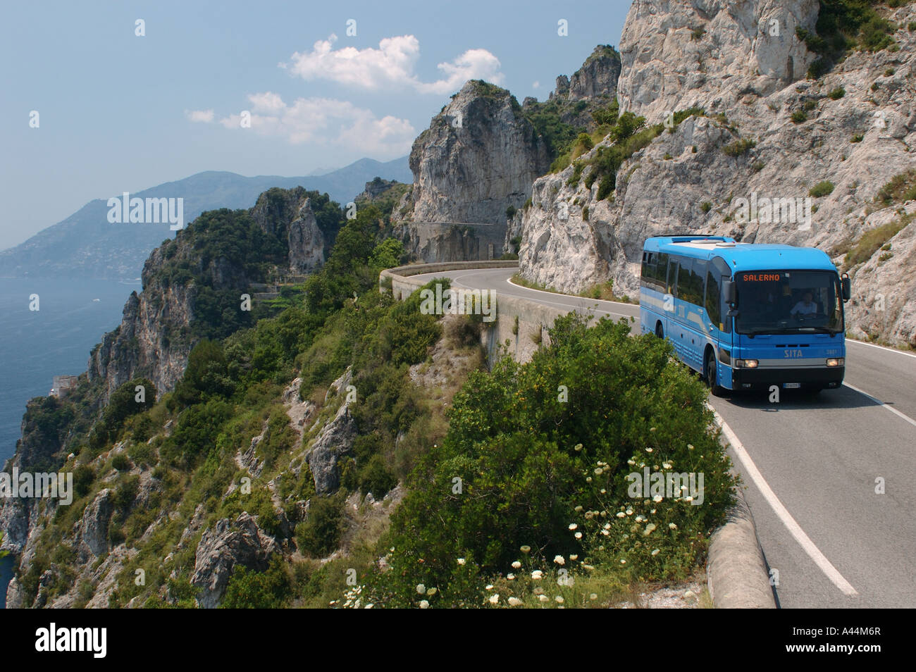 Bus on narrow and dangerous road, Amalfi Coast - Italy Stock Photo - Alamy