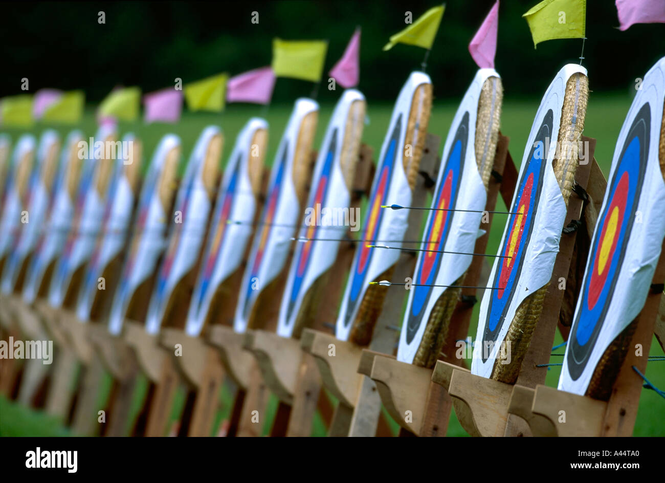 row of archery targets with flags arrows Stock Photo Alamy