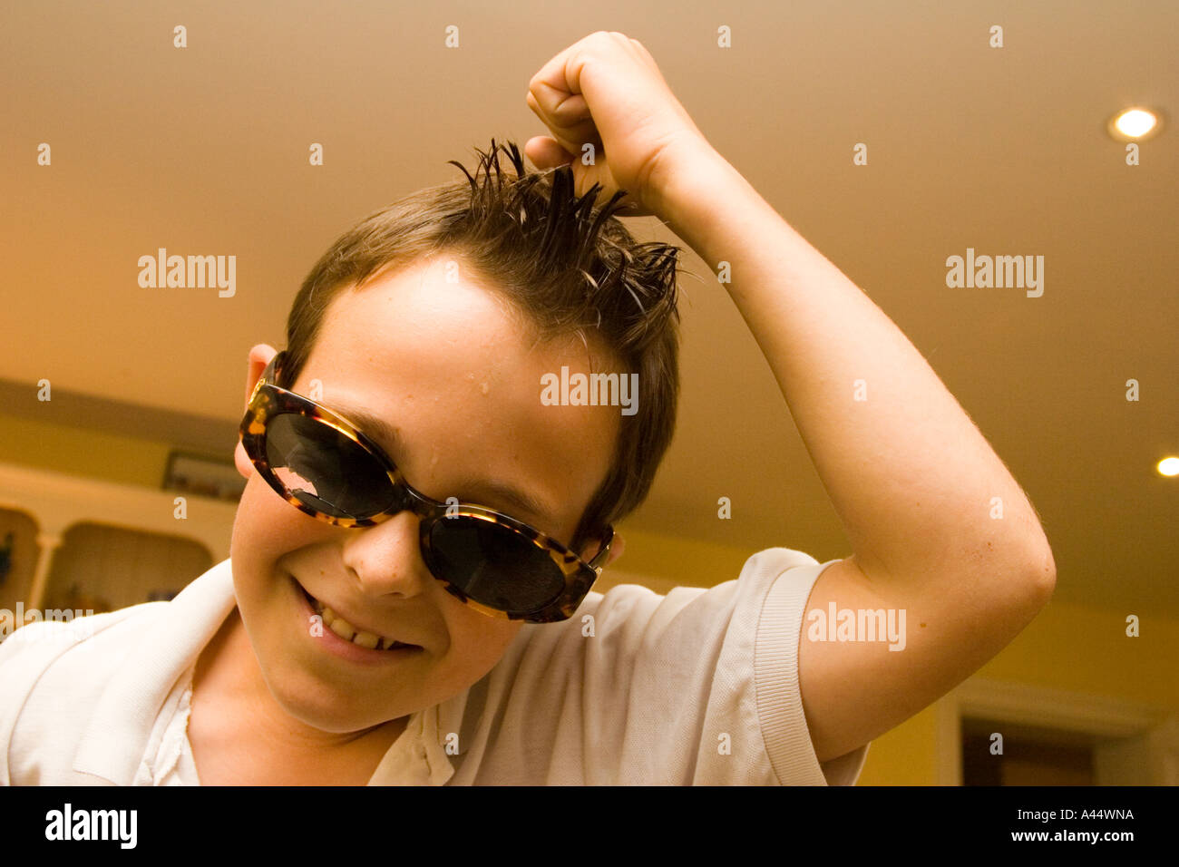 Portrait of a ten year old boy with sunglasses Stock Photo Alamy