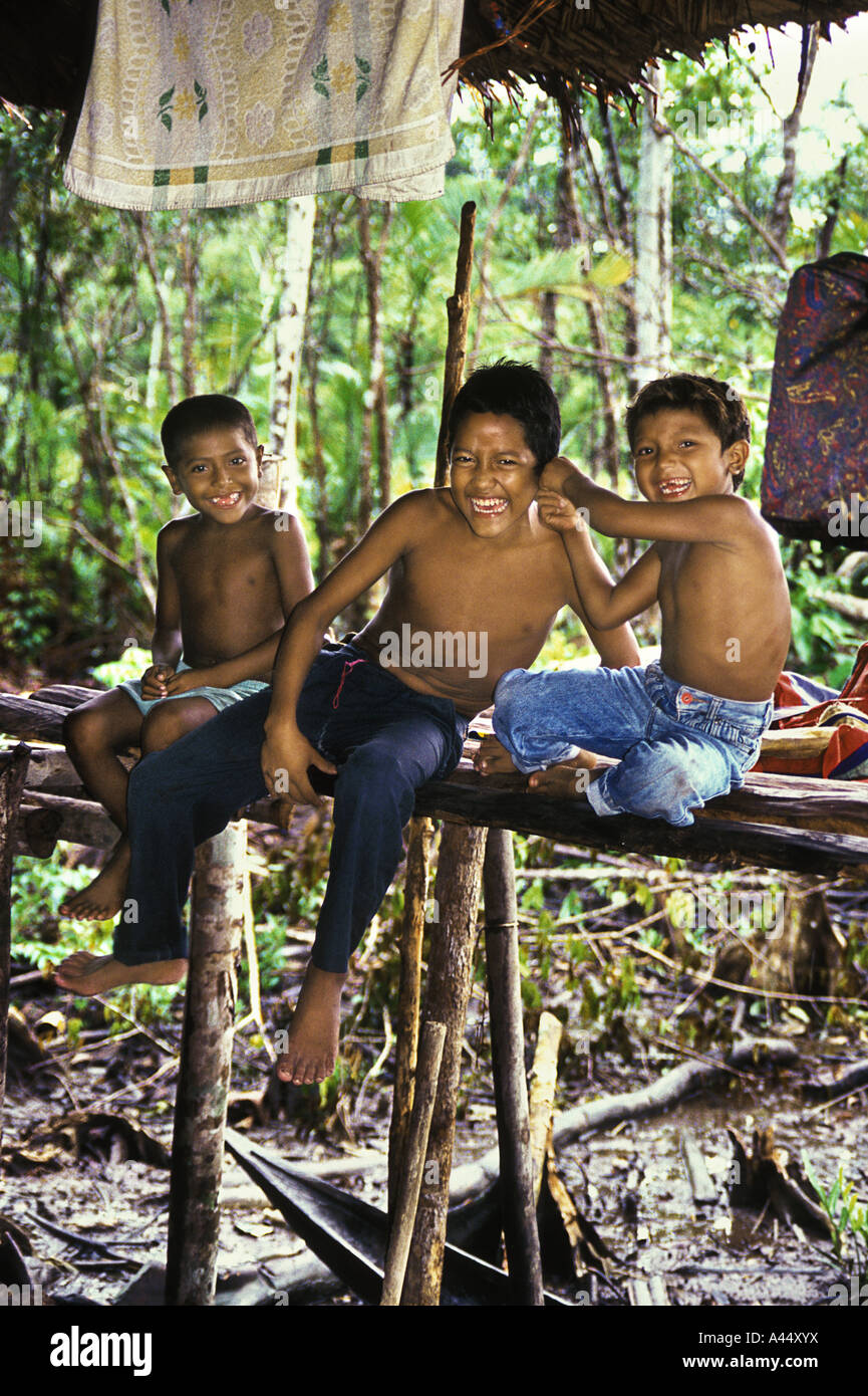 Warao kids in their home on the Orinoco river, Venezuela Stock Photo