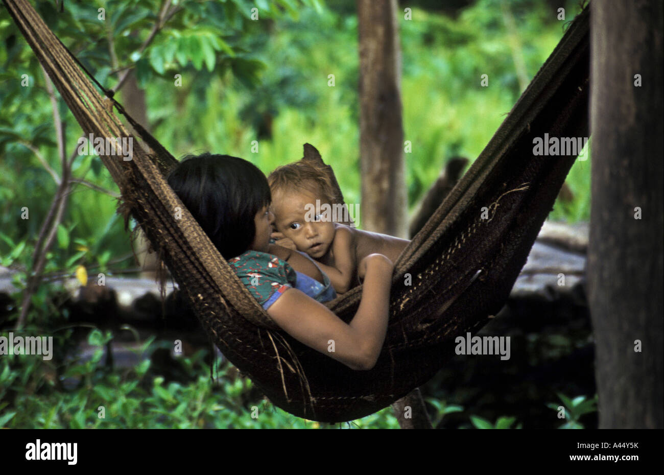 The  Warao Indians live on stilt houses in the Orinoco delta in Venezuela. They sleep on their hammocks Stock Photo