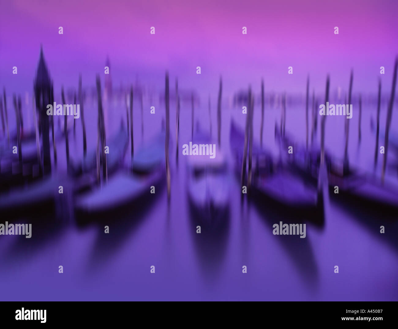 Gondolas moored in the lagoon Venice Italy Gondolas blurred Stock Photo ...