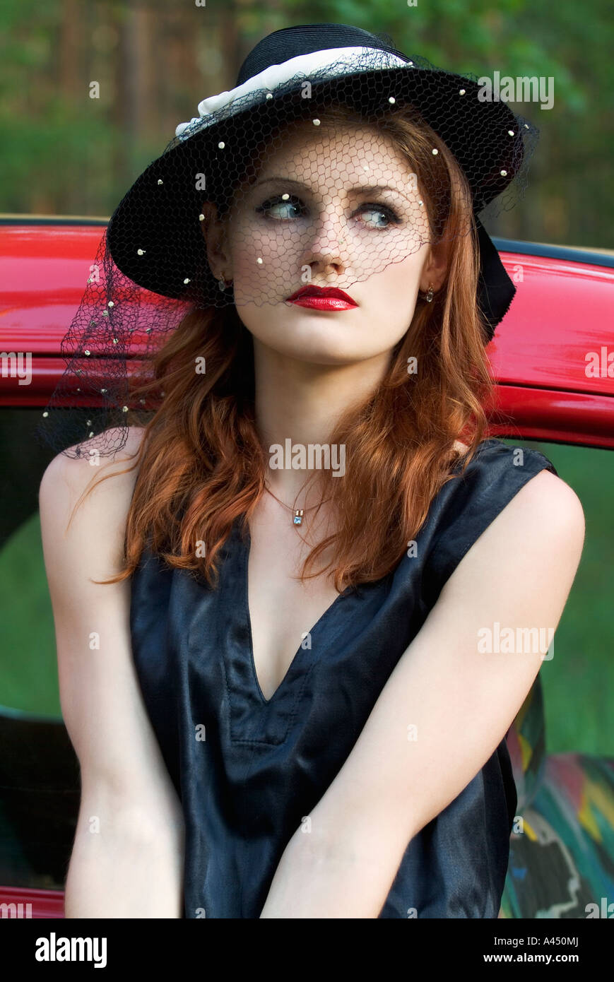 Woman with antique car Stock Photo - Alamy