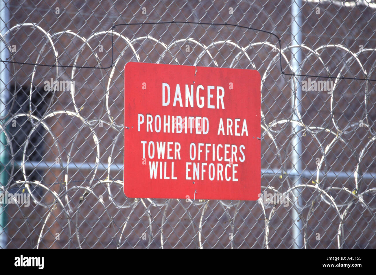 Sign on prison fence Nebraska State Penitentiary Stock Photo