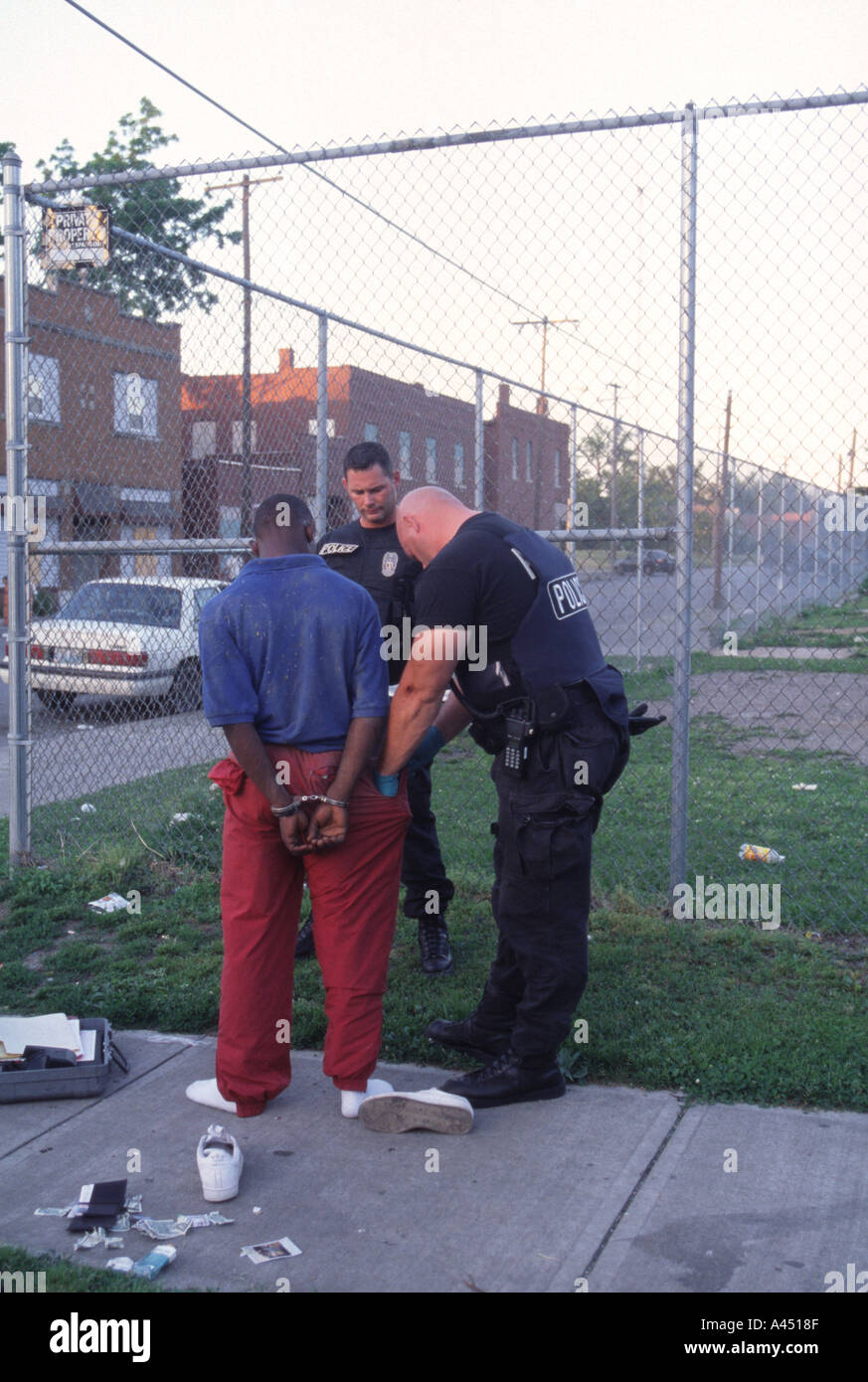 Frisking suspect hi-res stock photography and images - Alamy
