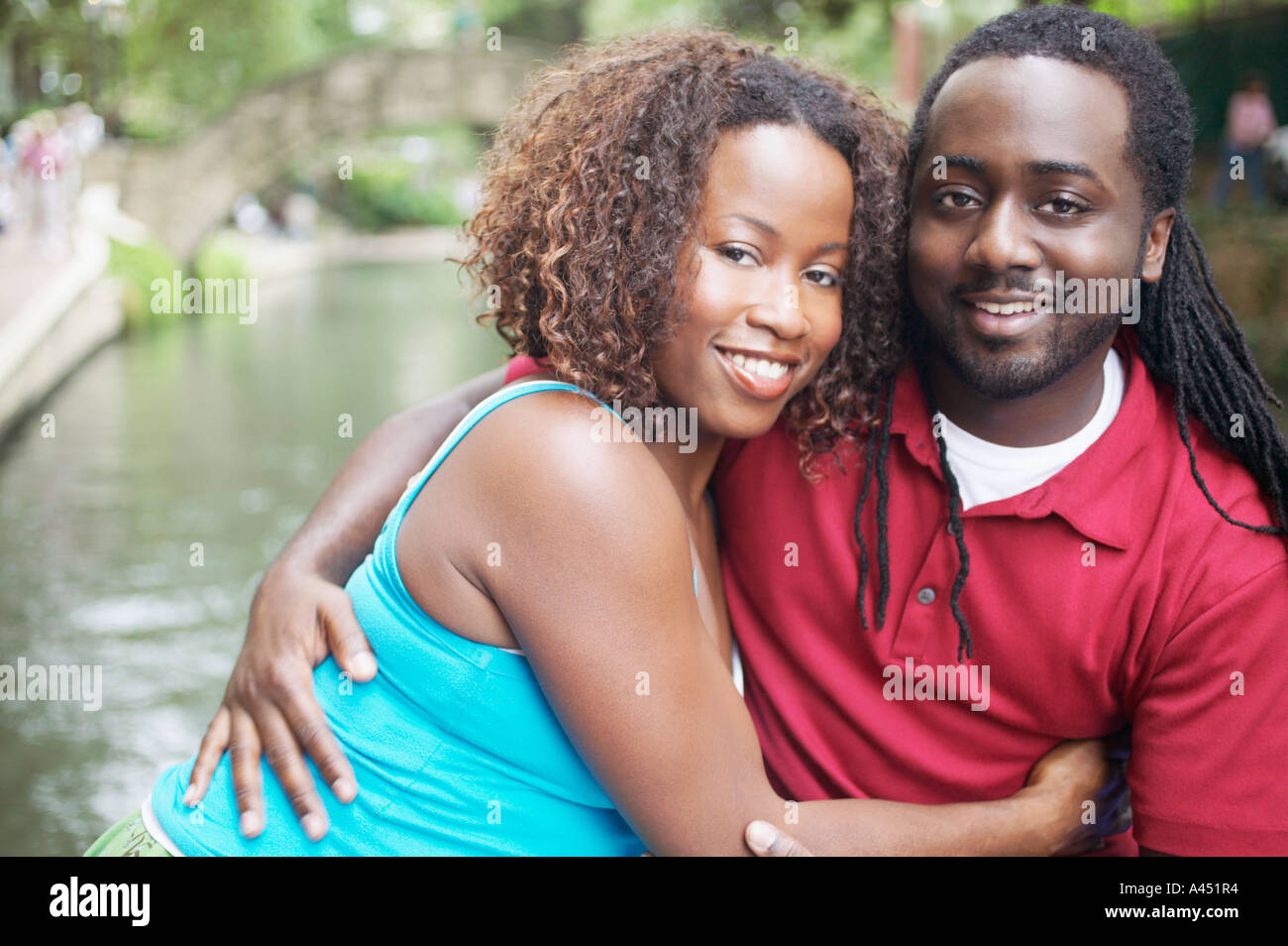 Couple with dreadlocks hugging hi-res stock photography and images - Alamy
