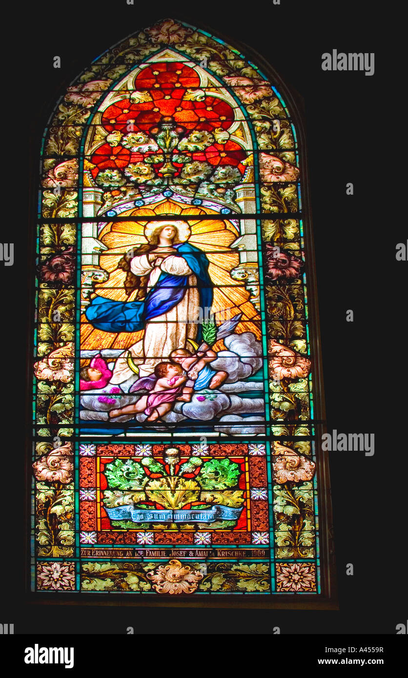 Symbolic colorful arched stained glass window Stock Photo Alamy