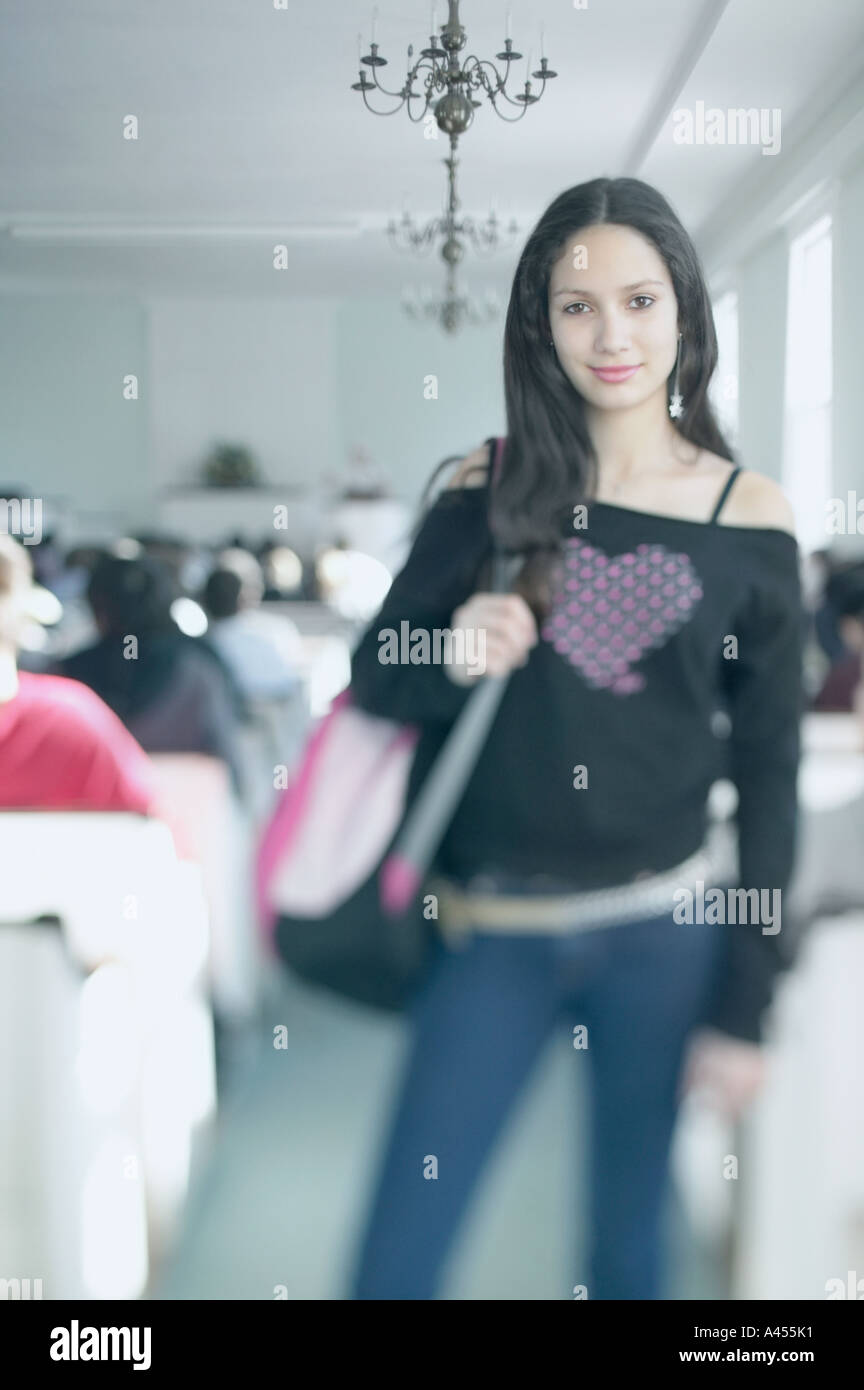 Teenage girl carrying shoulder bag Stock Photo Alamy