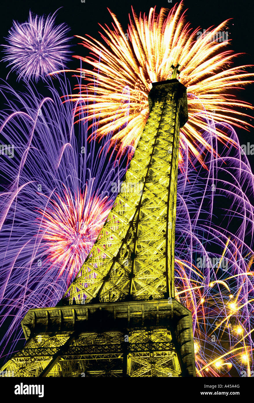 Eiffel tower at night with fireworks Stock Photo