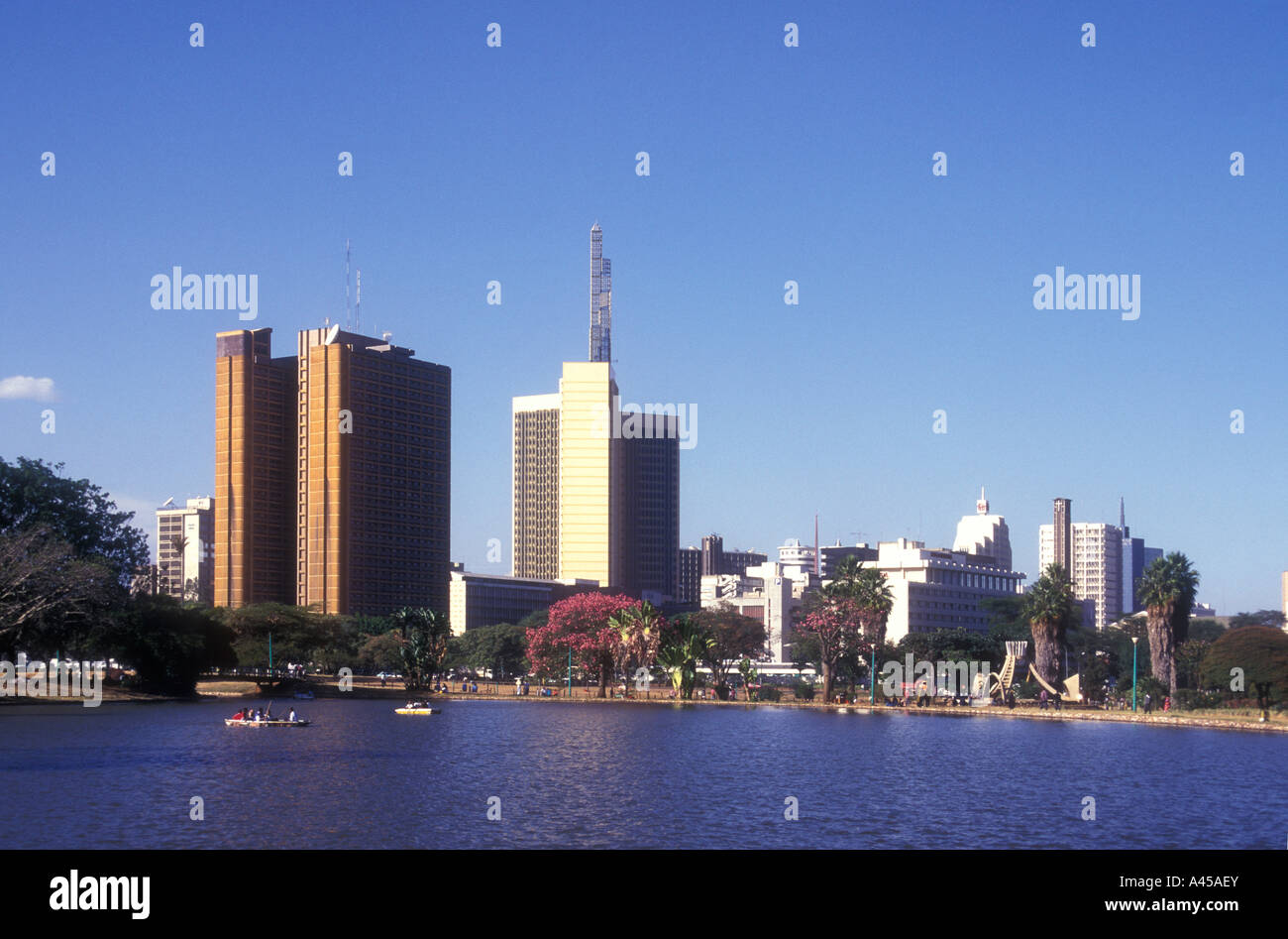 Nairobi city skyline seen from the boating lake in Uhuru Park Kenya East Africa Stock Photo