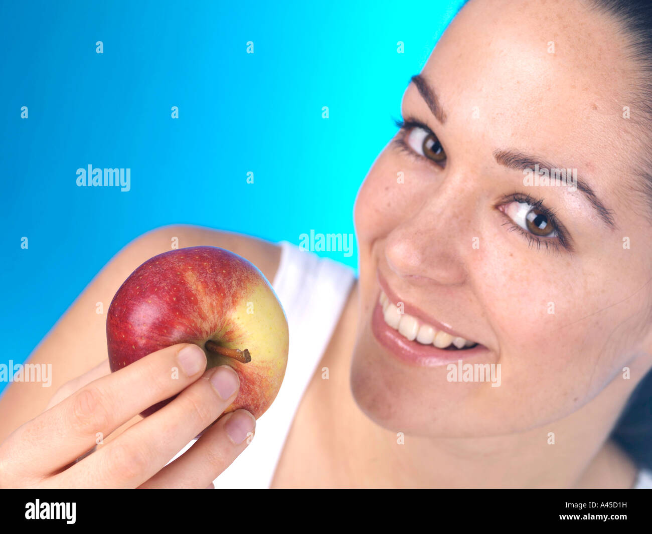 Young Woman Eating an Apple Model Released Stock Photo Alamy