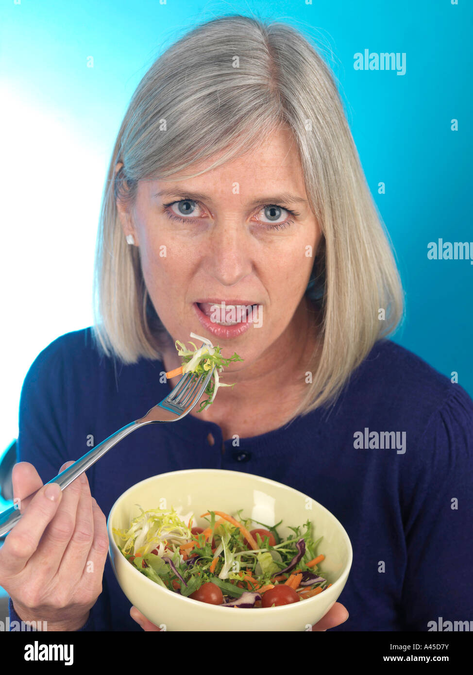 Mature Woman Eating Garden Salad Model Released Stock Photo Alamy