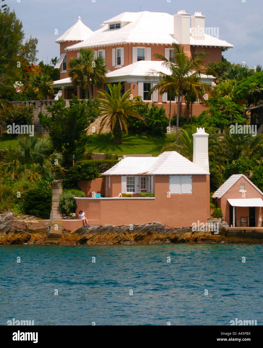 Homes in Pembroke Parish overlook the bay A boathouse mimics the design