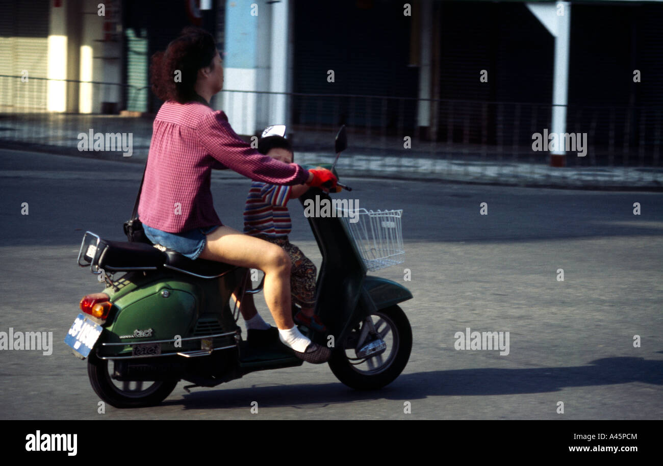 Mother and Child on Moped Taipei Taiwan Stock Photo Alamy