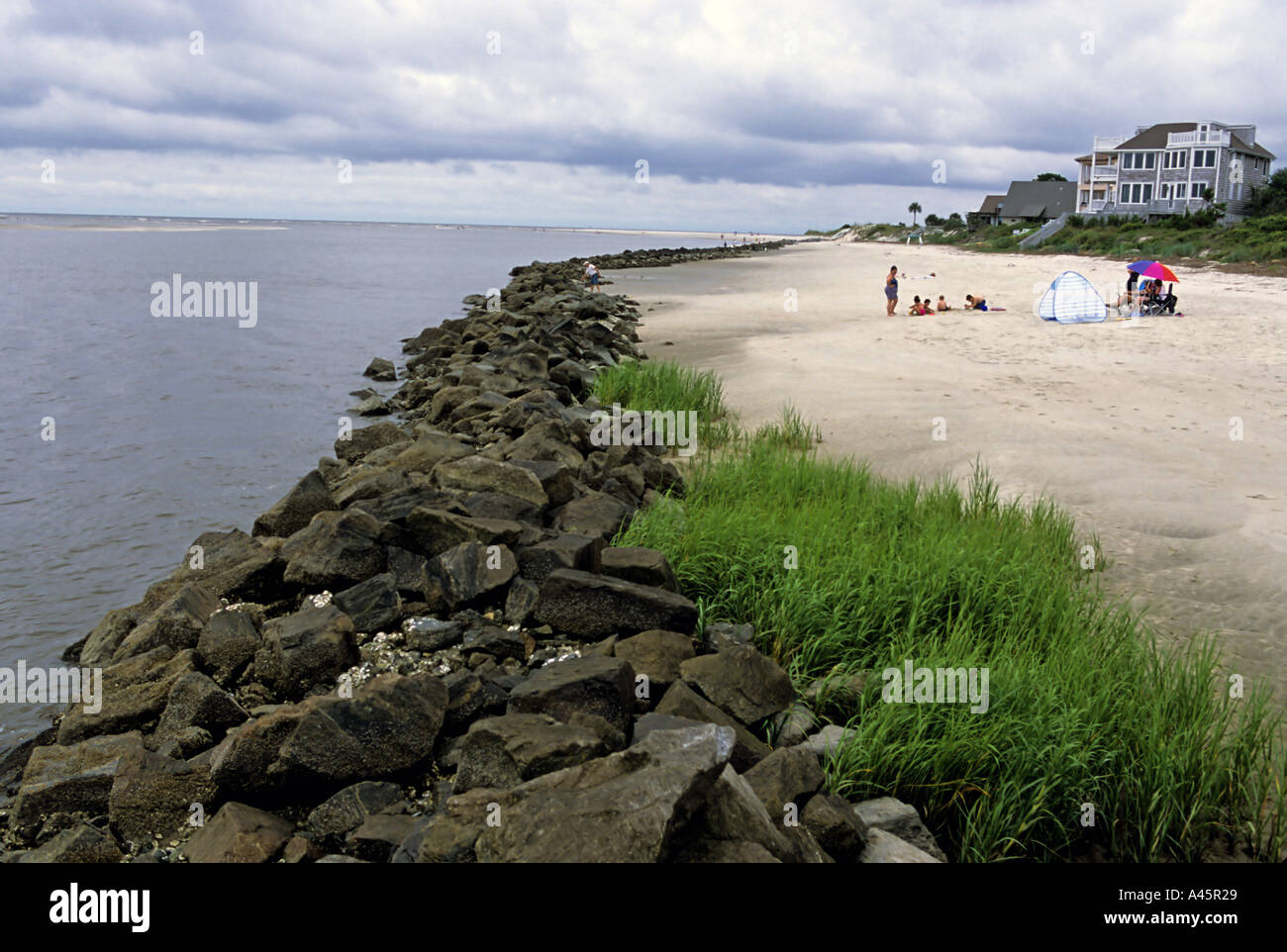 People enjoy a beach on St Simon an island off the Golden Coast