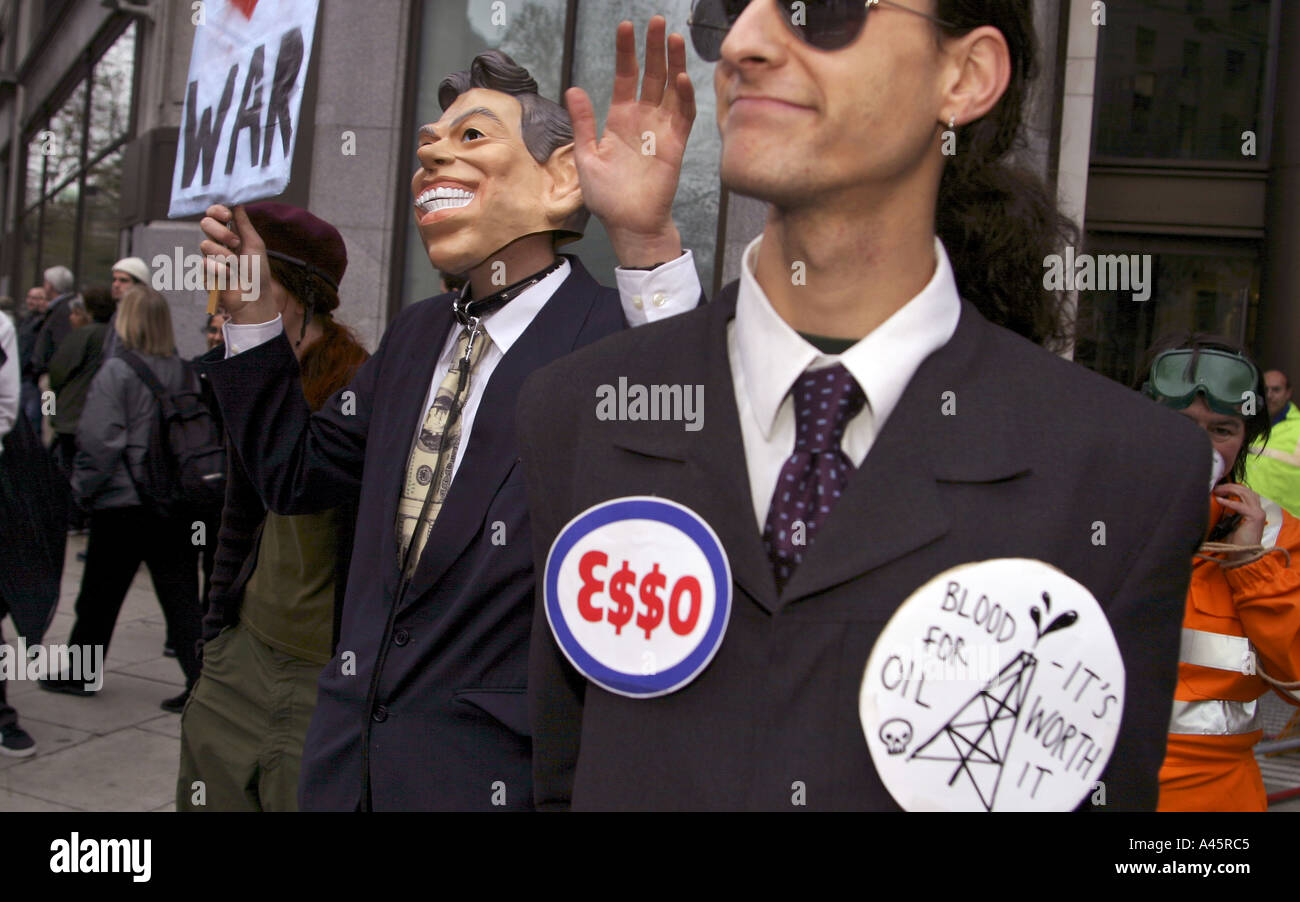 a british demonstrator wears a tony blair mask during a protest against the state visit of us president george w bush to london us foreign policy and the war in iraq Stock Photo