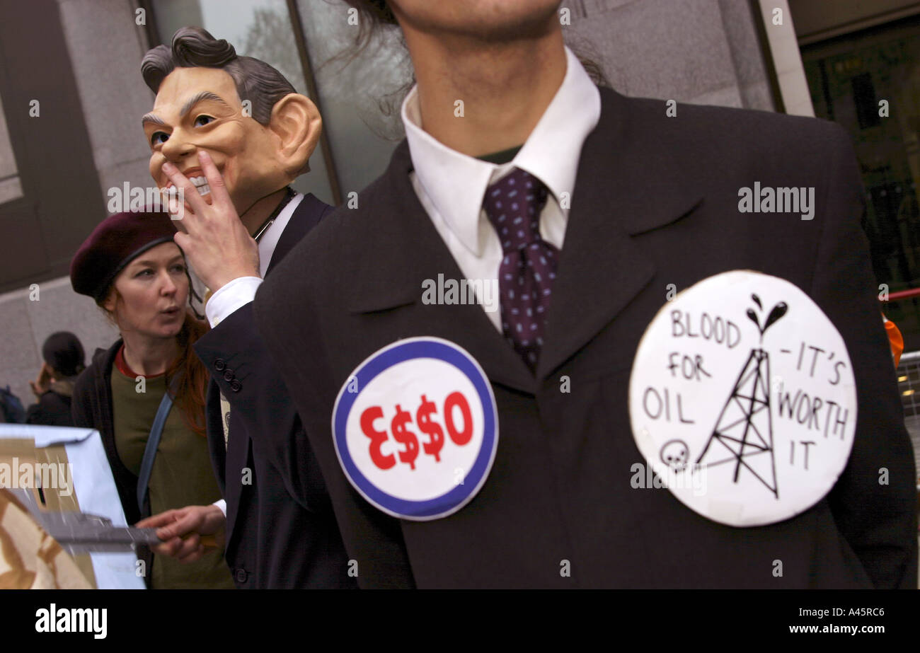 a british demonstrator wears a tony blair mask during a protest against the state visit of us president george w bush to london us foreign policy and the war in iraq Stock Photo