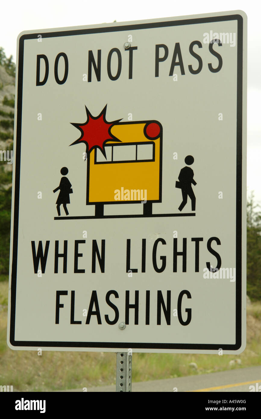 AJD55764, British Columbia, Canada, Do Not Pass When Lights are Flashing, School Bus road sign Stock Photo