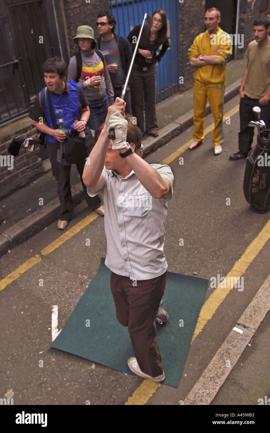 urban golf competitors on blackall street at the first shoreditch urban open tournament in london Stock Photo