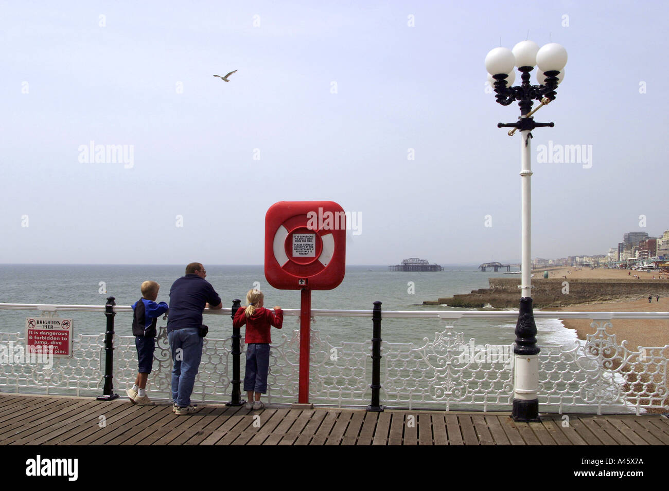 holidaymakers on brighton pier on the south coast of england Stock Photo