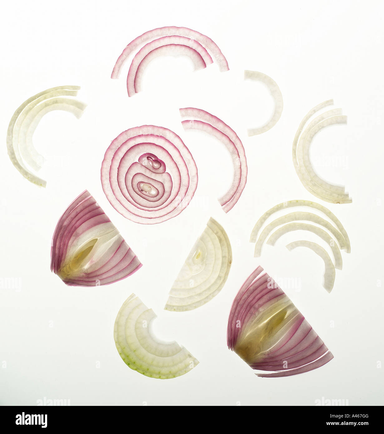 Sliced red onions on a white background Stock Photo - Alamy