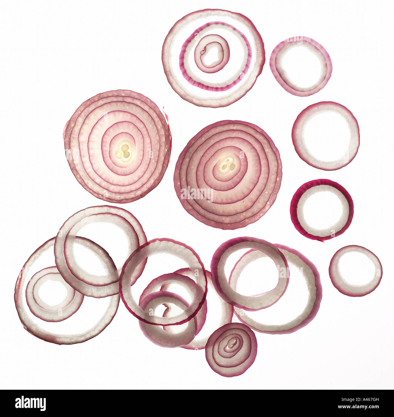 Sliced red onions on a white background Stock Photo - Alamy