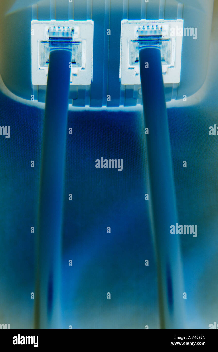 Telephone jacks plugged into wall outlet concept Stock Photo Alamy