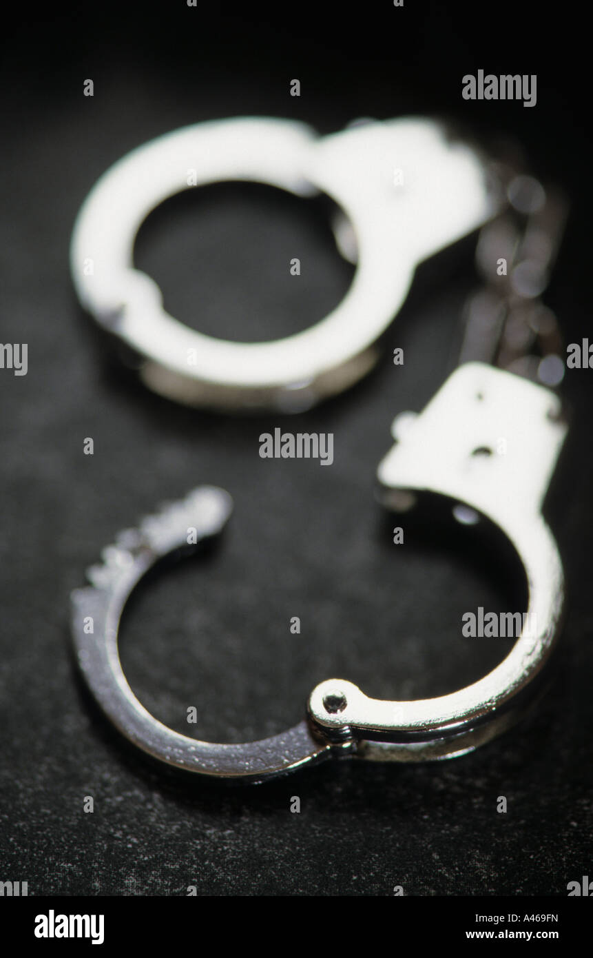 Crime concept image of handcuffs Stock Photo