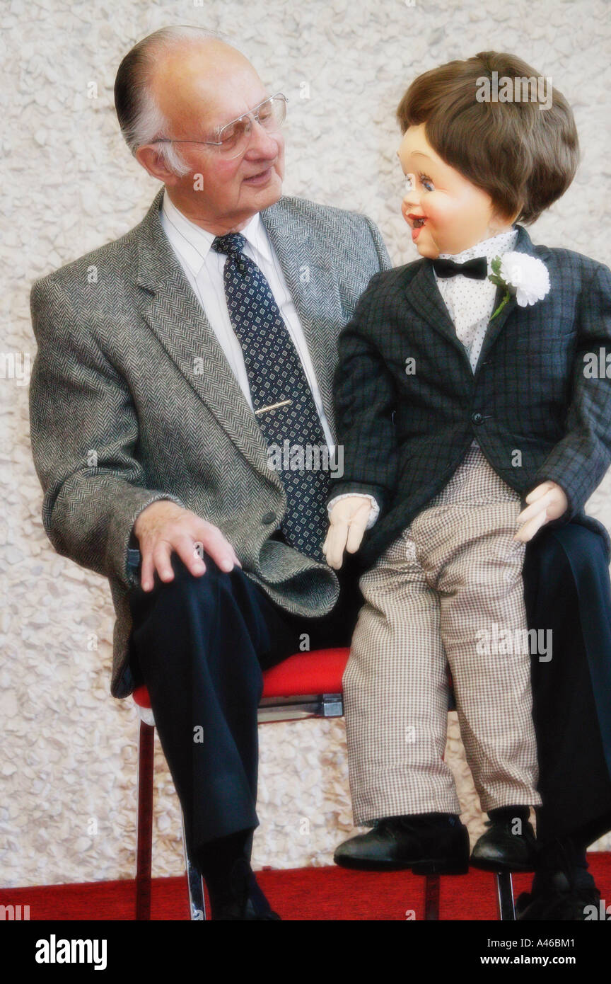 Ventriloquist with puppet Stock Photo Alamy