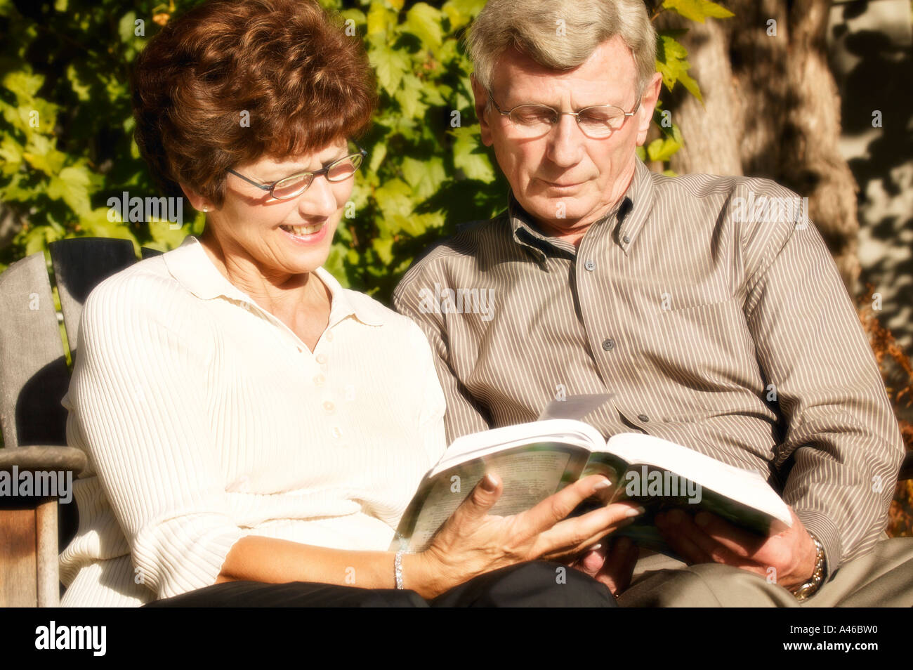 Couple read together Stock Photo