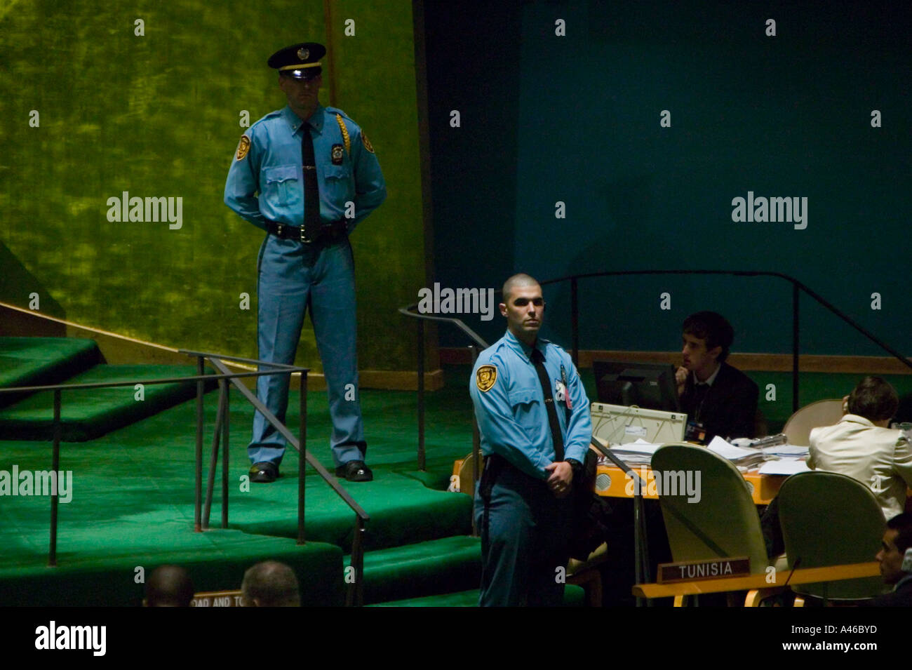 Security guards stand near podium in general assembly hall at United Nations headquarters in New York USA September 2005 Stock Photo