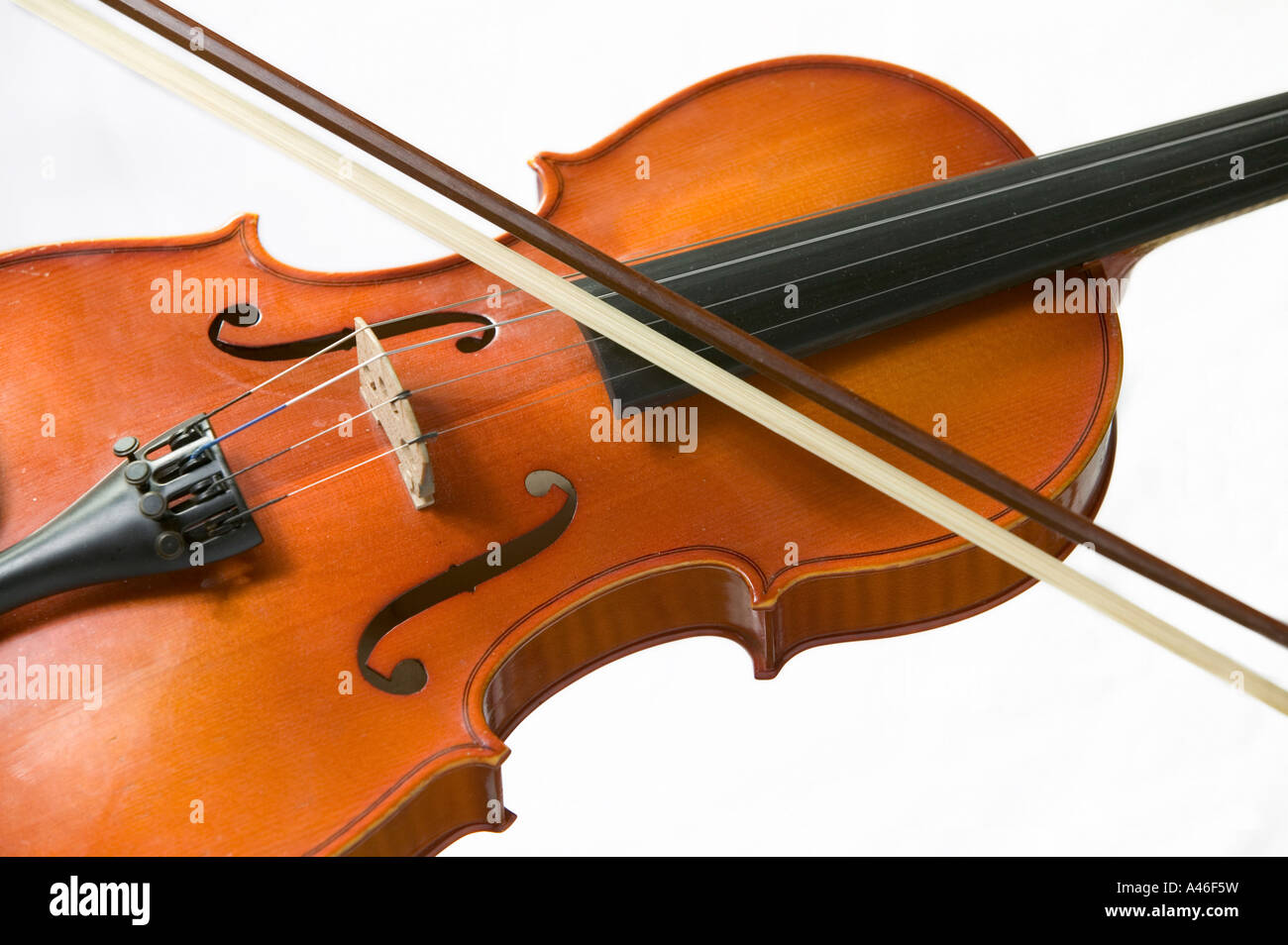Violin with a violin bow on white background Stock Photo
