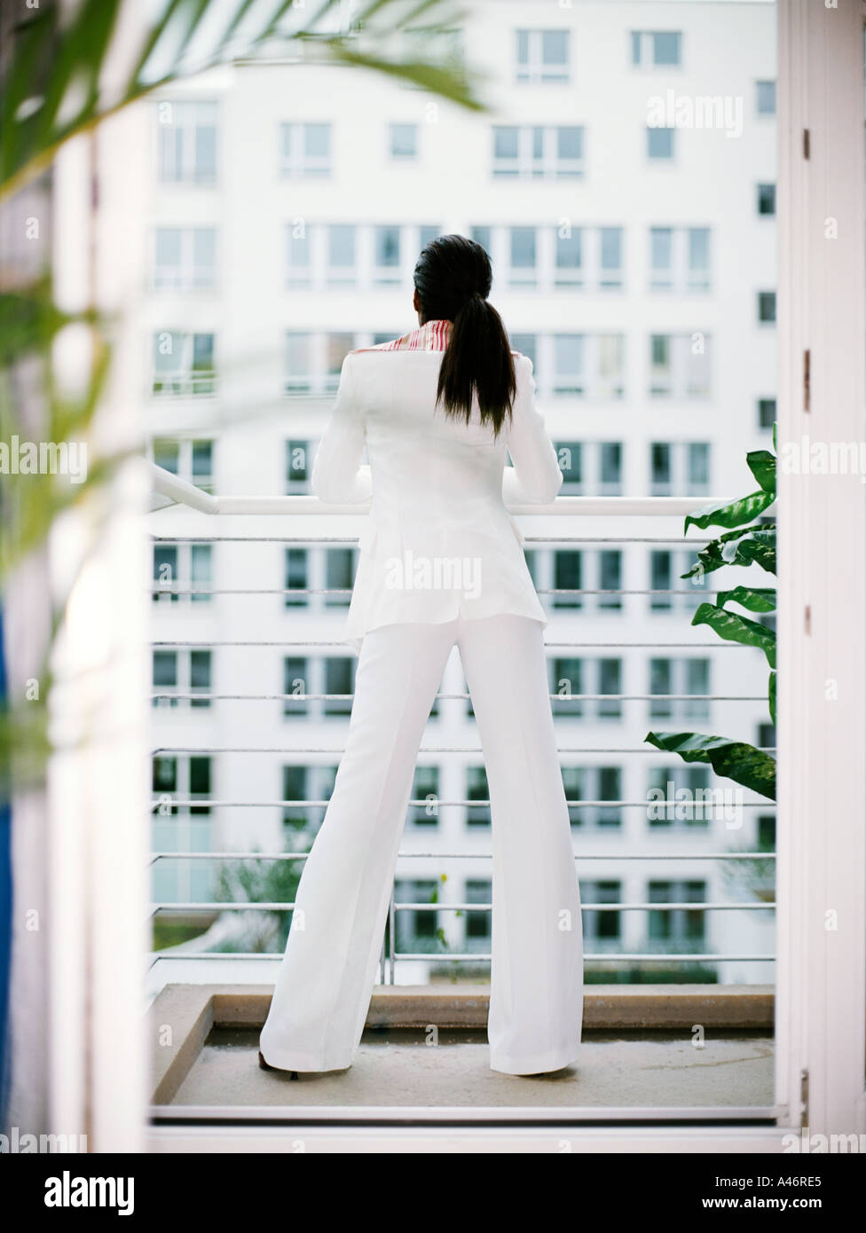 Black woman in white suit hi-res stock photography and images - Alamy