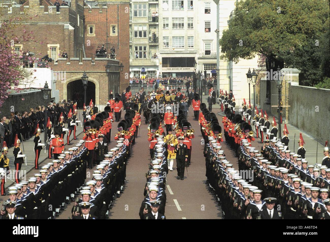 Members of the royal family march behind the Queen Mother s coffin Stock Photo