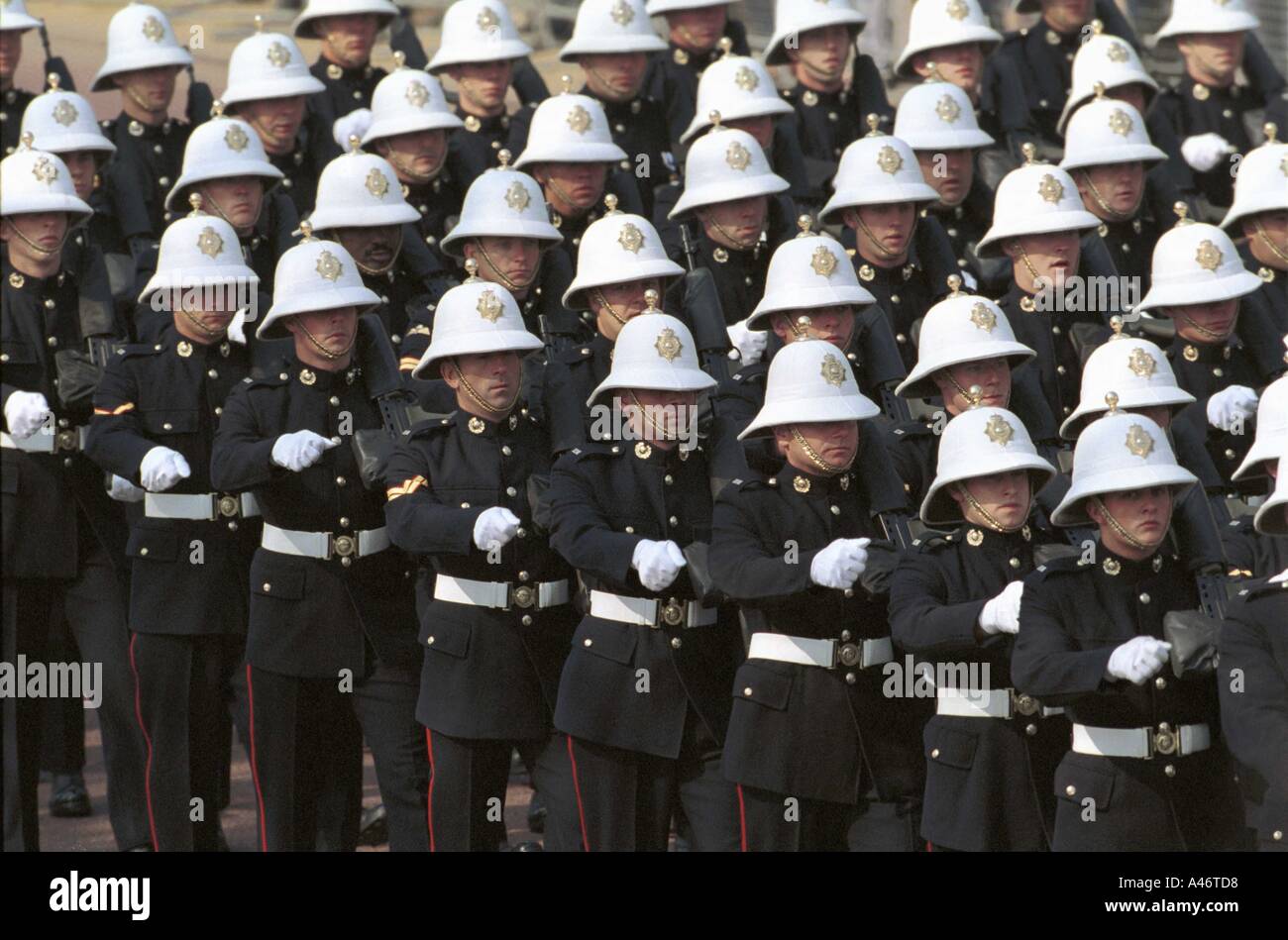 Members of the Royal Marines march in procession at the Queen Mother s funeral Stock Photo