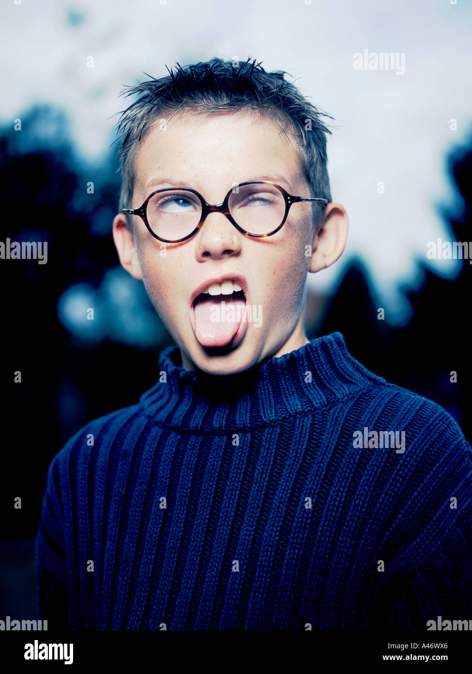 A young boy putting on a goofy face Stock Photo