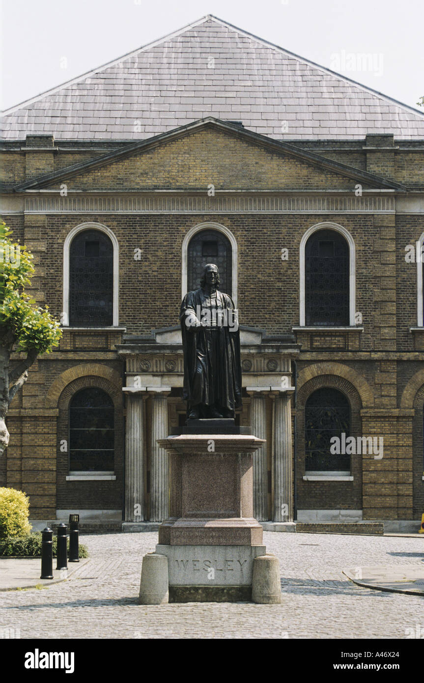 A statue of John Wesley the founder of Methodism outside the Weslyan Chapel and Laysian Mission, London, UK Stock Photo