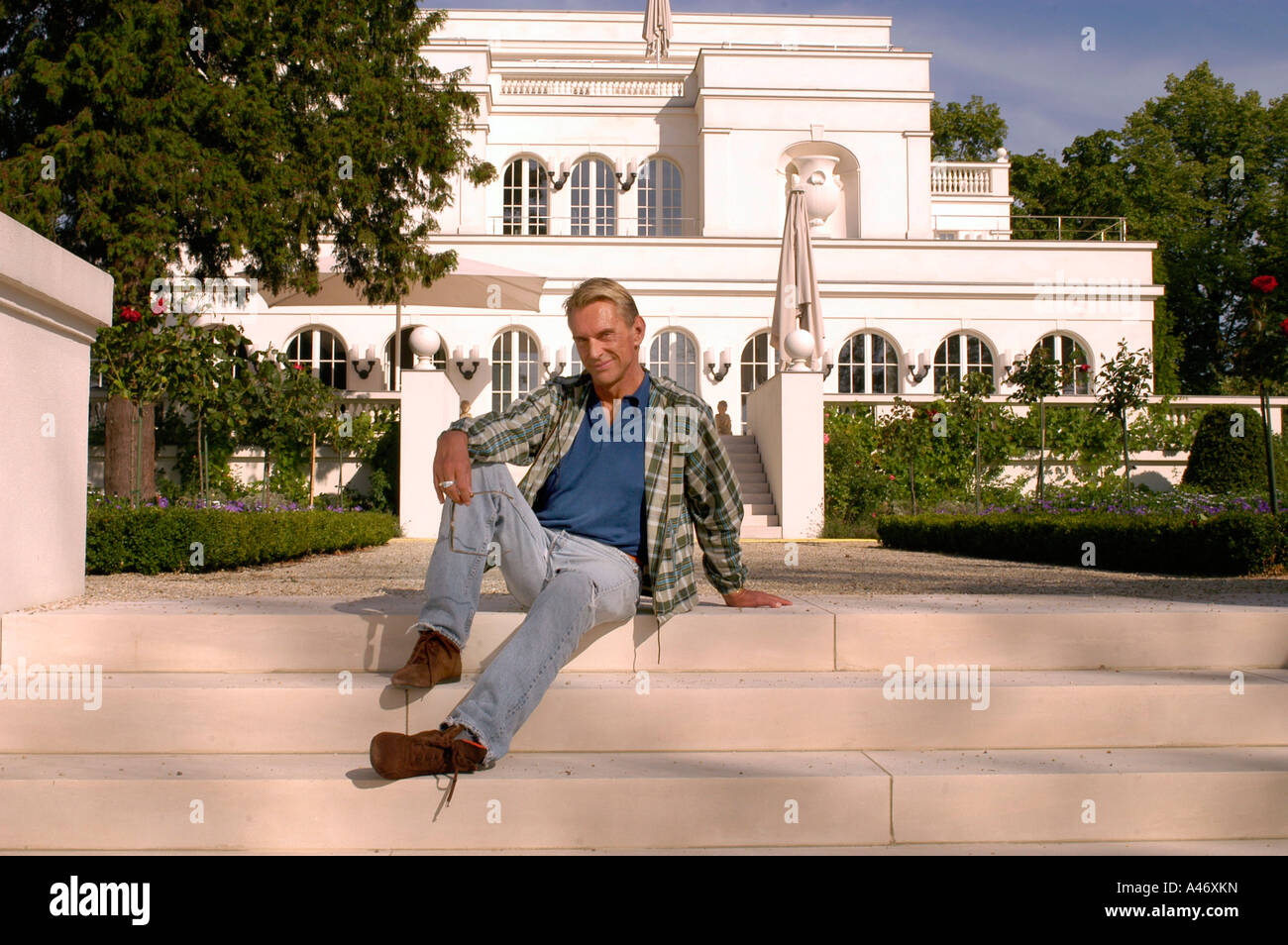 Fashion designer Wolfgang Joop in front of his villa in Potsdam,  Brandenburg, Germany Stock Photo - Alamy