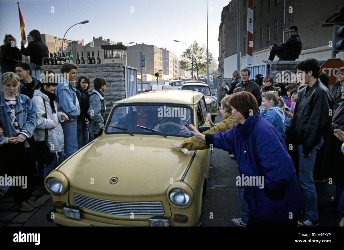 Fall of the Berlin Wall at the border crossing Chausseestrasse cars