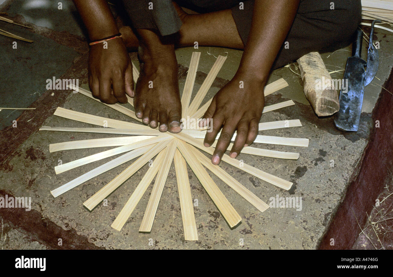 A man making a handicraft article Stock Photo - Alamy
