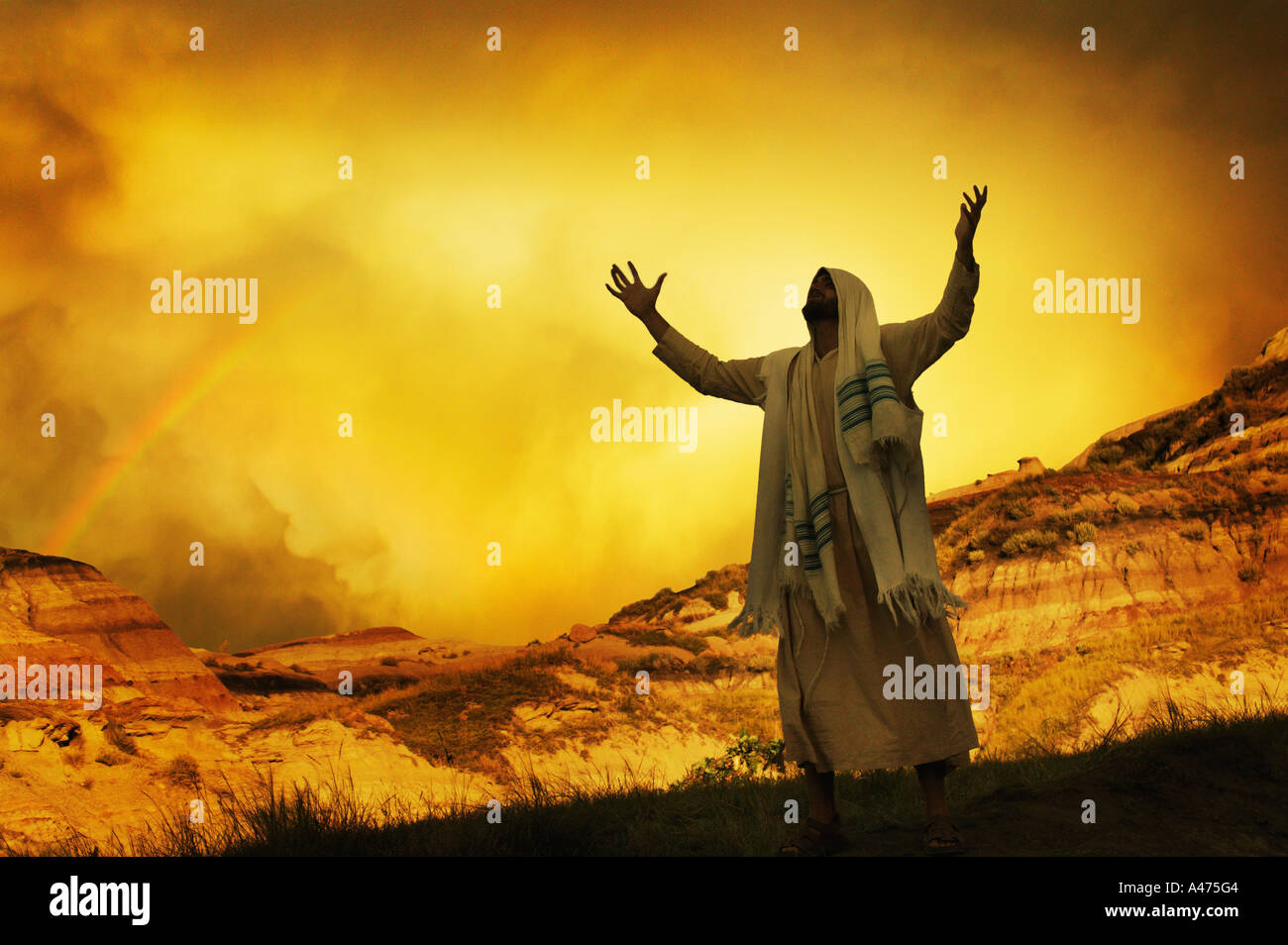 Jesus with arms stretched towards heaven Stock Photo