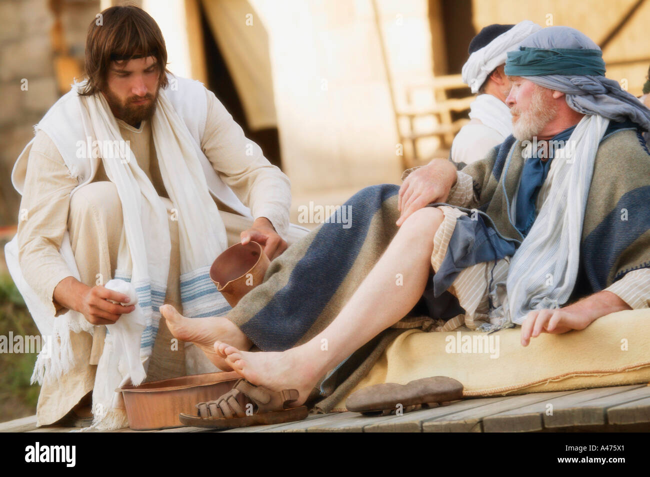 Jesus washes feet Stock Photo
